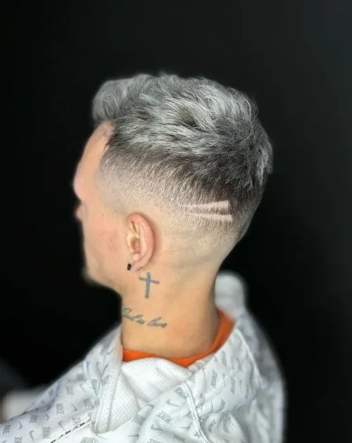 Close-up of a finished textured haircut and clean fade at Iconic Cuts